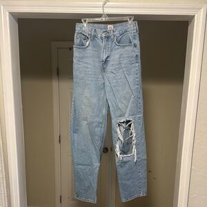 Woman’s Light Blue Distressed Jeans